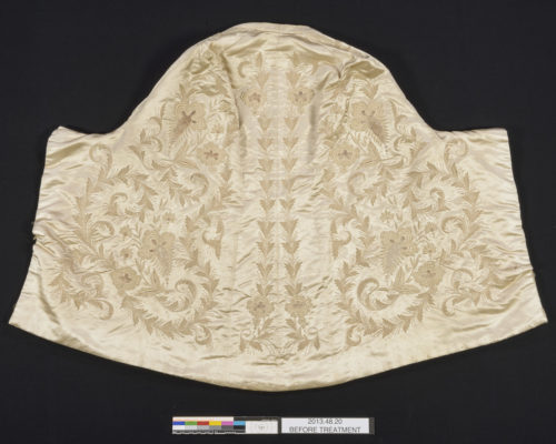 Mantle exterior, with intricate embroidery.